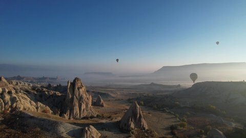 Goreme, NevsehirTurkey - October 15 2021, Foggy Morning in the Cappadocia Drone Video