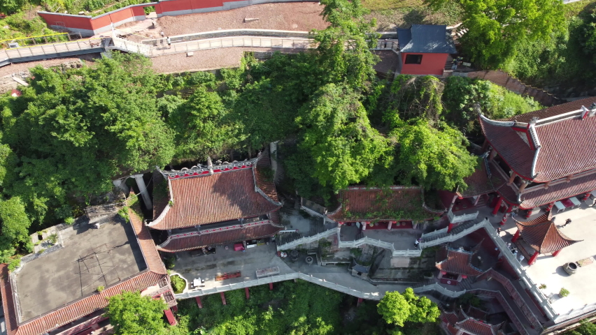 A hanging temple built on a cliff on a mountain