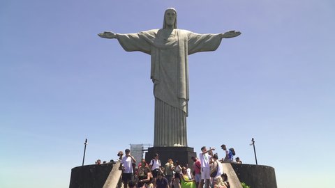RIO DE JANEIRO, BRAZIL - CIRCA 2022: Tourists visit Christ the Redeemer statue, the famous landmark of Rio de Janeiro.