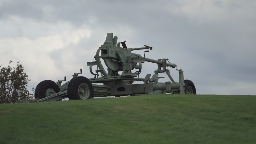 A close-up shot of the WW2 gun at the Bud coastal museum. Slow-motion, orbit.