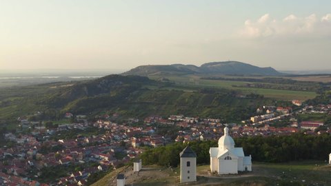 Saint Sebastian chapel and belfry tower on hill above Mikulov, drone.