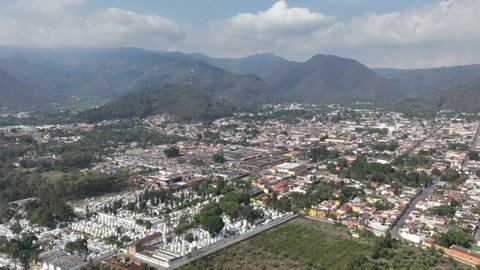 Slow aerial hyperlapse over Antigua Guatemala and the cemetery there.