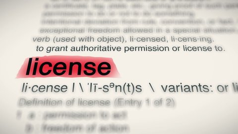 Sukabumi, Indonesia, May 14 2022: The Word License Red Highlighted in a Dictionary Animation