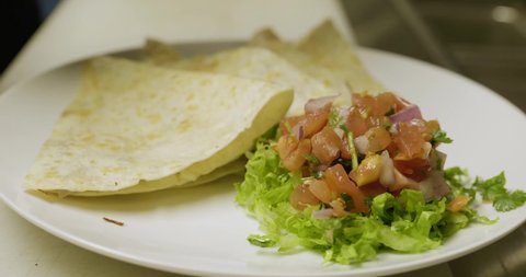 Quesadillas with fresh salad and pico de gallo. Mexican food. 