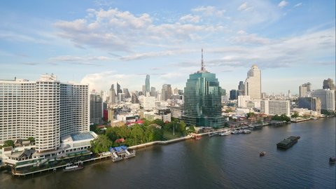 BANGKOK - THAILAND, JULY 2, 2021 :Time lapse skyline of Bangkok city around chaopraya river in Thailand
