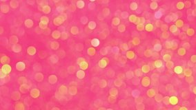 Pink, red, golden, festive, christmas new year background with glowing and sparkling defocused lights. Festive background. Golden lights on a red pink background. video clip hd