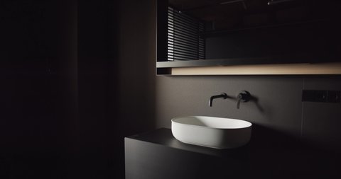 Real Contemporary minimalist bathroom with black and gray tone, with italian white furniture, elegance home 