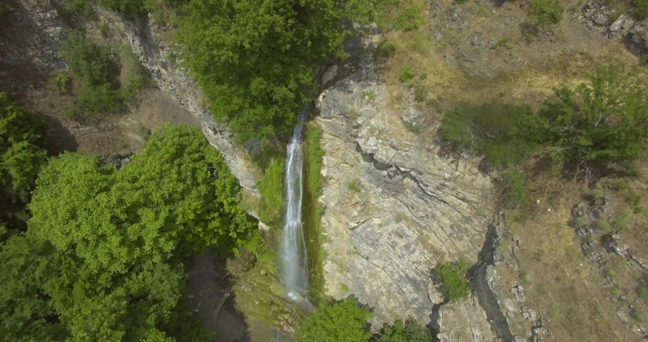 Waterfall Mountain Travel Summer Spring Autumn Epic Drone Shot Water Flowing Through High Cliffs Inspiration Epic Scale Nature Sight Seeing | Shutterstock HD Video #1090360531