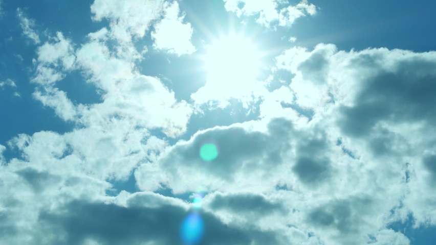 Blue Sky Sun White Clouds in Sunlight in Sunny Weather Timelapse. Sunny Cloudy Daytime Sky. Summer Sunny Skyscraper with White Clouds, Time Lapse. | Shutterstock HD Video #1090363011