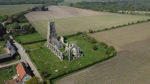 Panorama of St Andrews Church and fields of Covehithe in Suffolk, UK. Drone aerial view from above