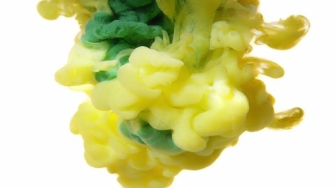 Yellow and green acrylic paint make an abstract explosion under water. Two ink colours mixing in liquid, isolated on white background. Slow motion 4K