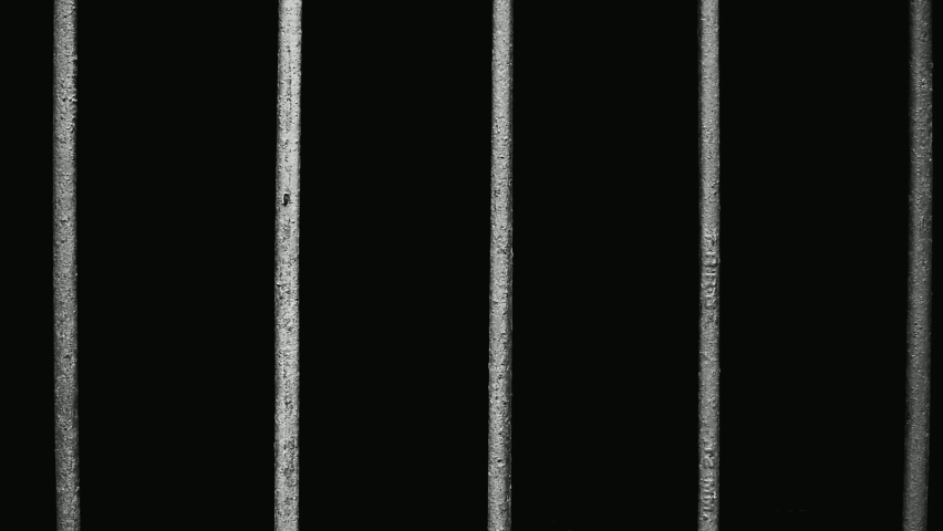 hand man hold steel in jail on black background in black and white tone.concept for prisoner,sadness,detain,erroneousness Royalty-Free Stock Footage #1090365839