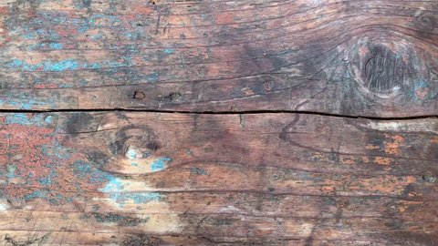 Wood texture with scuffs from blue paint. For advertising, video presentation.