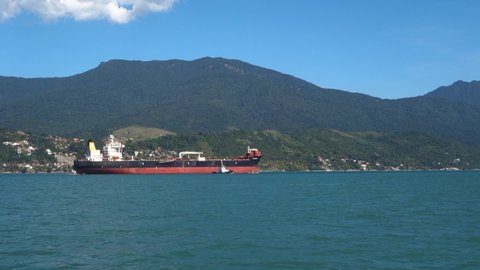 large bulk carrier ship on Ilhabela island bay in Sao Paulo coastline, Brazil