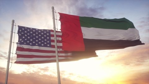 United Arab Emirates and United States flag on flagpole. UAE and USA waving flag in wind. UAE and United States diplomatic concept
