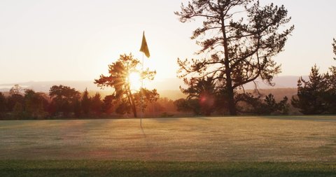 Video of golf field in summer at sunset. landscape, summer, sport and playing golf concept.