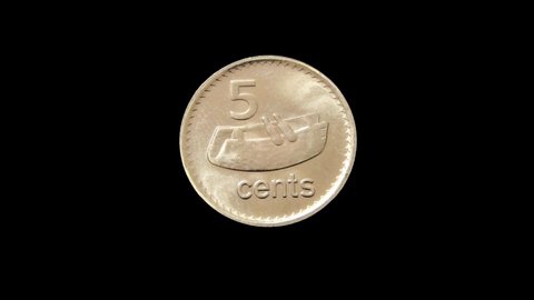 Rotating reverse of Fiji coin 5 cents. Isolated in black background.
