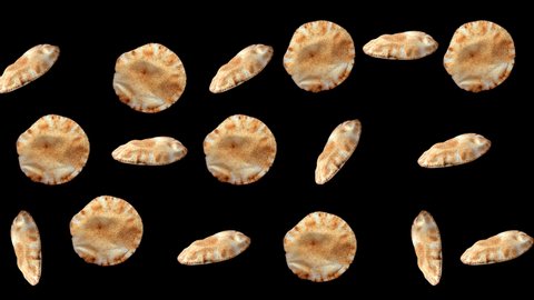 Pita bread falling down in slow motion on black background.Traditional and typical food of Arabic cuisine