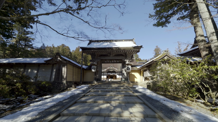 Cinematic gimbal shot of historic Buddhist temple at Mount Koya in Wakayama prefecture, Japan