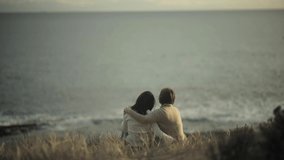 comforting friendly hug friends hugging empathy compassion sunset slow motion watching sunset at the beach - Powered by Shutterstock - Get 15% off with code: PIKWIZARD15