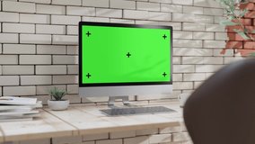 Empty desktop computer Mock-Up on work desk with decoration. Selective focus on  screen. Green screen for banner and logo. Animation, 3D Render. - Powered by Shutterstock - Get 15% off with code: PIKWIZARD15