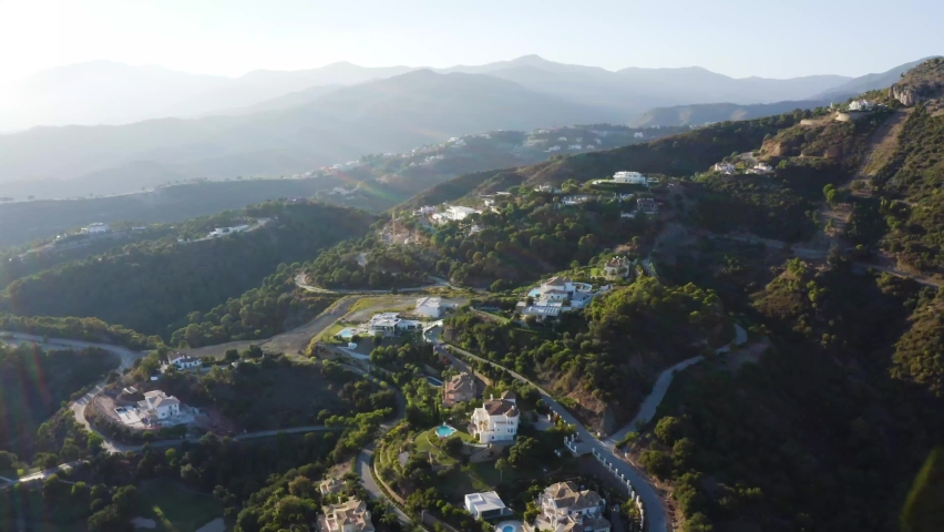 Aerial view of panoramic green lush valley in Marbella, Southern Spain. Holidays in Europe Royalty-Free Stock Footage #1090396811