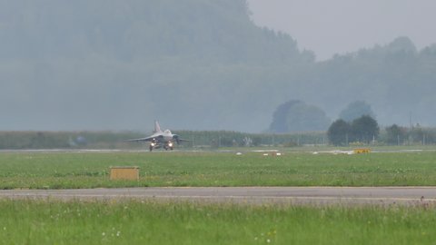 Zeltweg Austria SEPTEMBER, 6, 2019 Beautiful vintage fighter jet military airplane of the Cold War take off. Saab J-35 Draken of Swedish Air Force used to intercept Russian bombers
