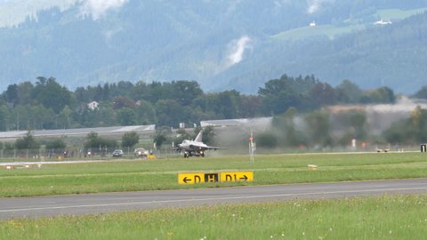 Zeltweg Austria SEPTEMBER, 6, 2019 Scenic vintage fighter jet airplane take off from wet runway in 4K. Saab J-35 Draken of Swedish Air Force that protected neutral Sweden skies againts Russian bombers