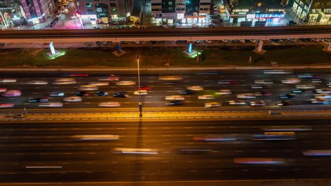Dubai, United Arab Emirates - October 20 2021: Night Time Lapse of traffic on Sheikh Zayed Road in Dubai