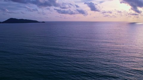 Dark sea water surface, Dynamic shot Aerial view of dark sea surface at Phuket Thailand, Beautiful Tropical sea with small waves at sunset Amazing nature and travel background
