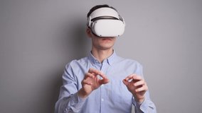 Man engineer wearing virtual reality headset in industrial plant.
