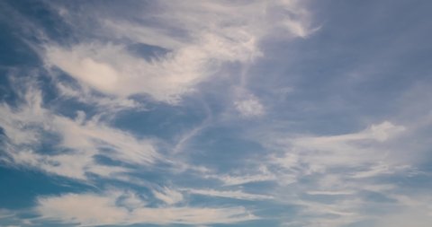 Timelapse of sky background with delicate white cirrus clouds