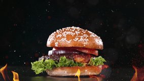 Beef Burger Ingredients Falling and Landing in the Bun with Fire Flames. Super Slow Motion at 1000 fps. - Powered by Shutterstock - Get 15% off with code: PIKWIZARD15