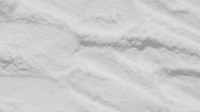 White powder texture video. Maltodextrin, dextrose background footage. Diet supplement, glucosamine, fructose. Collagen or protein, sport bioadditive like lysine, guarana, valine spreading by spatula
