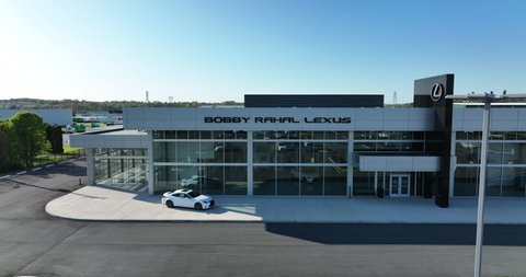 Lancaster , PA , United States - 05 08 2022: Aerial truck shot of Lexus dealership and showroom. New and used car center for sales in automotive industry.