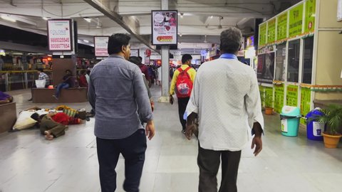 hyderabad , TS , India - 05 16 2022: People walking at the Hyderabad railway station