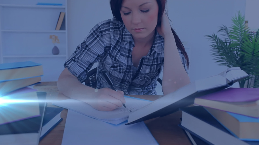 Animation of light over caucasian woman writing in notebook. hand writing, making notes and learning concept digitally generated video. | Shutterstock HD Video #1090431751