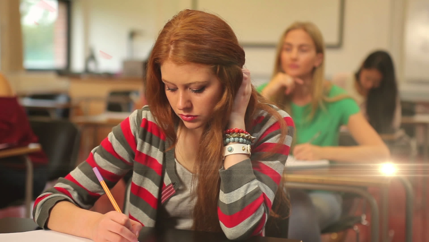 Animation of light over diverse female students writing in notebooks. hand writing, making notes and learning concept digitally generated video. | Shutterstock HD Video #1090431965