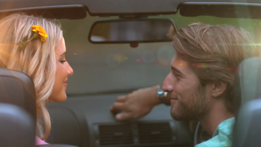 Animation of light over happy caucasian couple kissing in car. love, romantic relationship and valentines day concept digitally generated video. | Shutterstock HD Video #1090432375