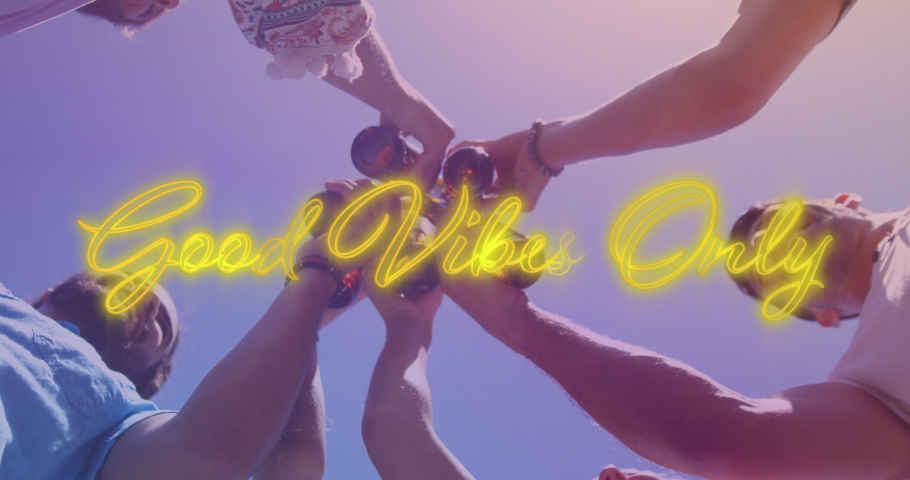 Animation of good vibes only over hands of diverse male friends toasting with beer. drinking beer, socializing and relaxing concept digitally generated video. | Shutterstock HD Video #1090432427