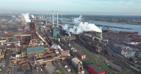 Ijmuiden, 6th of may 2022, The Netherlands. Tata steel Heavy industrial factory plant facility. Engineering founding steel works blast furnace chimney industry production technology plant. Aerial