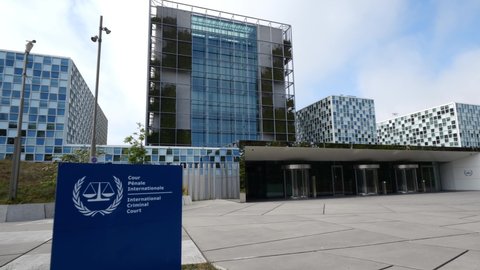 Hague, Netherlands, May 7 2022: The International Criminal Court. ICC has jurisdiction to prosecute individuals for the crimes of genocide, crimes against humanity, war and aggression crimes  Adlı Haber Amaçlı Stok Video