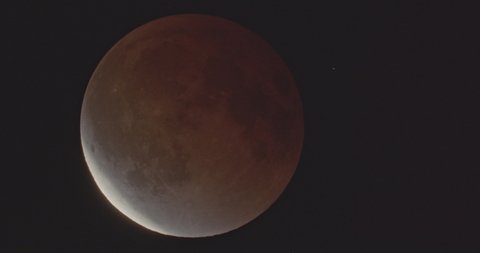 Lunar Eclipse Moon Emerging from Earth's shadow