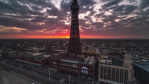 Establishing Aerial View Shot of Blackpool UK, Lancashire, England United Kingdom, divine light, sunrise, rise up crane shot