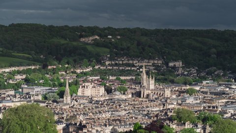 Establishing Aerial View Shot of Bath UK, Somerset, England United Kingdom day, city skyline, dark clouds gathering