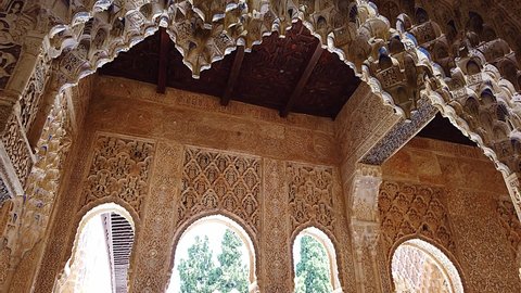 Alhambra, Granada, Spain - July 18 2019 : The complex and intricate honeycombed roof decoration of the Nasrid Palace.