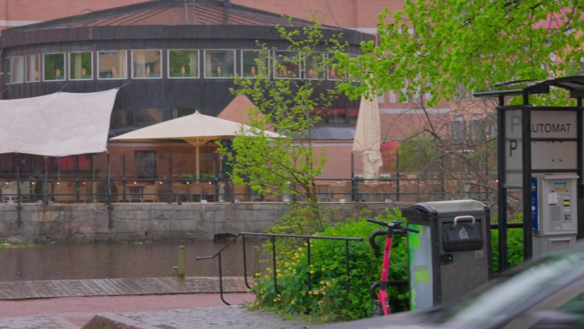 Beautiful view of historic Uppsala Cathedral Church during heavy rain in spring. Sweden.