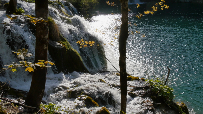 Lower lakes canyon of Plitvice Lakes National Park. One of the oldest and largest National parks in Croatia. Plitvicka Jezera. Small cascades of the waterfall flowing over the turquoise lake water 4K
