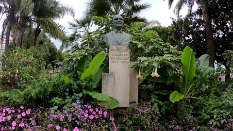 Cannes, France, October 3, 2021: SLOW MOTION - President Georges Pompidou memorial. Bust of Georges Pompidou in Square Reynaldo Hahn in Cannes. Cannes hosts the annual Cannes Film festival since 1949.