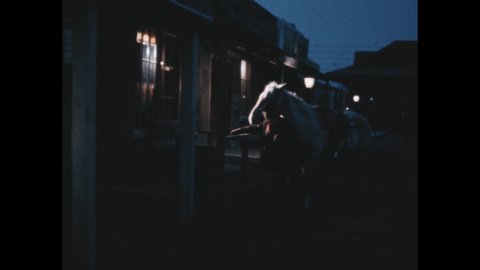 1880s: man outside Sheriff’s office with horse at night. Wild Bill’s Hang Out. Sheriff talks with man in street. Sheriff shoots man in street.Lady in street at night. Farmer ploughs field.
